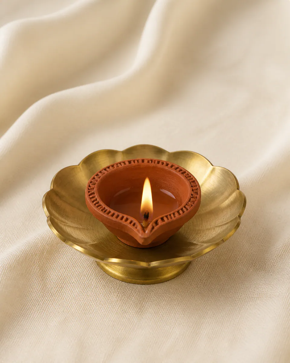 Decorative diya holder on a simple warm surface